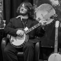 Banjo bliss in the Deering booth at World of Bluegrass 2022 (9/28/22) - photo © Jeromie Stephens