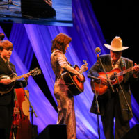 Eric Thorin, Wyatt Ellis, Molly Tuttle, and Max Wareham perform with Peter Rowan during his Bluegrass Music Hall of Fame induction - photo © Frank Baker