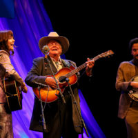 Molly Tuttle and Max Wareham perform with Peter Rowan during his Bluegrass Music Hall of Fame induction - photo © Frank Baker