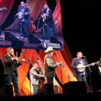 Doyle Lawson and The Radio Ramblers play in tribute to Paul "Moon" Mullins during his Bluegrass Music Hall of Fame induction - photo © Frank Baker