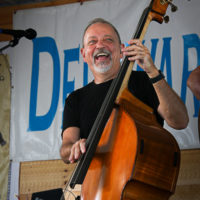 Ronnie Simpkins with Seldom Scene at the 2022 Delaware Valley Bluegrass Festival - photo by Frank Baker