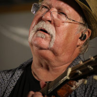 Dudley Connell with Seldom Scene at the 2022 Delaware Valley Bluegrass Festival - photo by Frank Baker