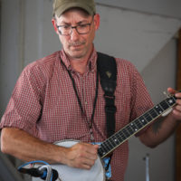 Josh Ellis with The New Ballard Branch Bogtrotters at the 2022 Delaware Valley Bluegrass Festival - photo by Frank Baker