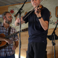 Patrick McAvinue sits in with Michael Cleveland at the 2022 Delaware Valley Bluegrass Festival - photo by Frank Baker
