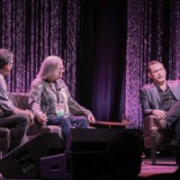 Craig Havighurst interviews Dale Ann Bradley and C.J. Lewandowski at the 2022 World of Bluegrass Keynote event - photo © Frank Baker