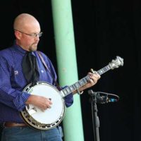 Brian Aldridge with Wood Family Tradition at the 2022 Camp Springs Bluegrass Festival - photo by Laura Tate Photography