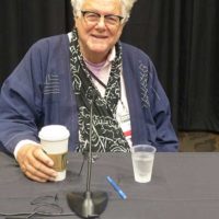 Peter Rowan speaks at the IBMA Session with 2022 Hall of Fame inductees - photo by Sandy Hatley