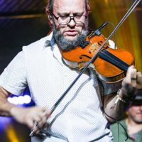 Jeremy Garrett with Infamous Stringdusters at The Salvage Station - photo © Bryce Lafoon
