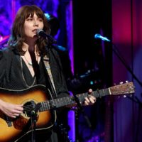 Molly Tuttle performs Tennessee Blues during Keith Whitley's induction into the Country Music Hall of Fame (10/16/22) - photo by Terry Wyatt/Getty Images for Country Music Hall of Fame and Museum