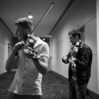 Hallway fiddle jam at IBMA Bluegrass Live! - photo © Jeromie Stephens