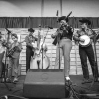 Kody Norris Show backs up Leo Lindblom for Bluegrass Karaoke at IBMA Bluegrass Live! (10/1/22) - photo © Jeromie Stephens