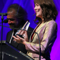 Molly Tuttle accepting the Female Vocalist of the Year award (9/29/22) - photo © Frank Baker