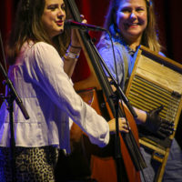 Vickie Vaughn and Celia Wordsmith with Della Mae at the IBMA Bluegrass Live! festival (10/1/22) - photo © Frank Baker