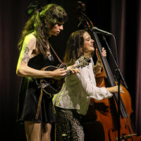 Maddie Witler and Vickie Vaughn with Della Mae at the IBMA Bluegrass Live! festival (10/1/22) - photo © Frank Baker