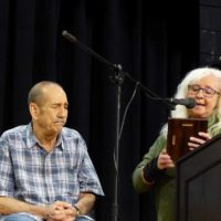 Jim Fraley is honored by Vivian Hopkins at the Granite Quarry Fiddlers’ Convention (10/8/22) - photo by Gary Hatley