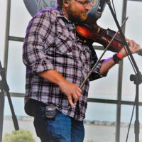 Adam Haynes with The Grascals at the 2022 Bluegrass Island Festival - photo © Deb Miller