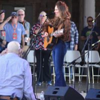 Caroline Owens opens  the 2022 Bluegrass Island Festival with the National Anthem - photo © Deb Miller