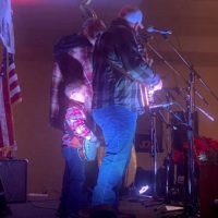 Littlest banjo picker, Kole Shifflett, shines with Shenandoah Drive and his dad, Jeremy, at the 2022 Merry Mountain Christmas in Grottoes, VA