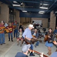 Deeper Shade of Blue leads a jam at the 2023 Yeehaw Music Fest - photo © Bill Warren