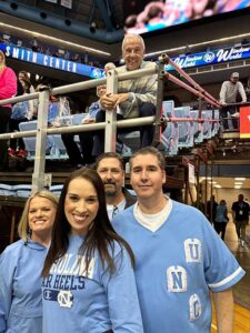Former UNC basketball coach Roy Williams with Darin & Brooke Aldridge, and Darin's brother, Devon, and sister-in-law, Andrea Aldridge.