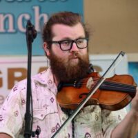 James Schlender with Songs From The Road Band at the 2023 EMS Springfest - photo © Bill Warren