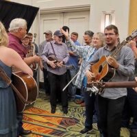 Doyle Lawson jams with the bands at the 2023 Bluegrass in the Blue Ridge - photo by Molly Moore