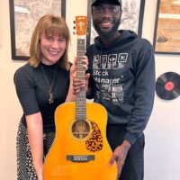 Aynsley Porchak with James Davidson from Ghana at ETSU and his new Blueridge BR-160 guitar