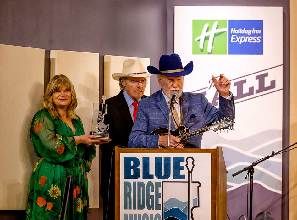 Doyle Lawson’s Acceptance Speech at the Blue Ridge Music Hall of Fame: Cindy Baucom, Terry Baucom, and Doyle Lawson - photo by Monty and Brenda Combs