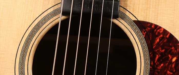 Thin Body Acoustic — Handmade Guitars - Luthier School - Guitar Repair