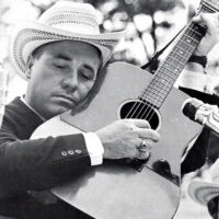  Earl Scruggs with his1955 Martin D-18 (Clemson University, 1964) - photo courtesy of Collectiques