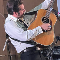 Chris Malpass doing Johnny Cash at the 2023 Malpass Brothers Bluegrass & Country Festival - photo by Gary Hatley