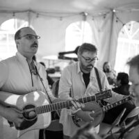 Josh Williams and Ron Stewart warm up with Southern Legacy backstage during the inaugural Tony Rice Memorial Day Musicfest at Camp Springs (5/27/23) - photo © Jeromie Stephens