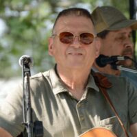Jim LaPrad with The Band of Brothers at the 2023 Kentuckians of Michigan Bluegrass in the Park - photo © Bill Warren