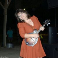 Debbie Williamson with Williamson Branch at the 2023 Charlotte Bluegrass Festival - photo © Bill Warren