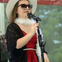 Caroline Williamson with Williamson Branch at the 2023 Charlotte Bluegrass Festival - photo © Bill Warren