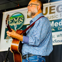 Jimmy Haynes with The Farm Hands at the 2023 Cherokee Bluegrass Festival - photo © Laci Mack