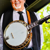 Marc Pruett with Balsam Range at the 2023 Cherokee Bluegrass Festival - photo © Laci Mack