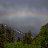 Rainbow after the rain at the 50th anniversary Telluride Bluegrass Festival (2023) - photo © Anthony Verkuilen