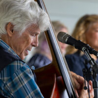 Tom Gray with Valerie Smith & Liberty Pike at the 2023 Jenny Brook Bluegrass Festival - photo © Dennis Crawford