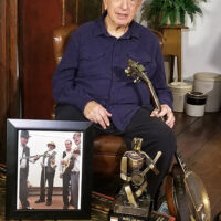 Roger with momentos during his combination induction into the American Banjo Museum Hall of Fame and 90th birthday celebration, August 30, 2020, at the home of Erick Feucht in Connecticut - photo © Richard D. Smith