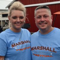 Promoters Jeremie and Alexus Cole at the 2023 Marshall Bluegrass Festival - photo © Bill Warren