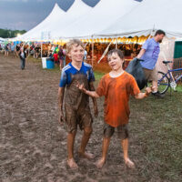 Post mud puddle fun at the 2023 Grey Fox Bluegrass Festival - photo © Tara Linhardt