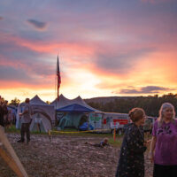 Sunset in the campground at the 2023 Grey Fox Bluegrass Festival - photo © Tara Linhardt