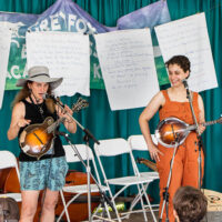 Tara Linhardt & Zoe Levitt talk and perform at the Grey Fox Kids Academy at the 2023 Grey Fox Bluegrass Festival - photo © Tara Linhardt