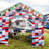 Custom campsite with quilted walls at the 2023 Grey Fox Bluegrass Festival - photo © Tara Linhardt