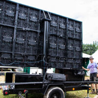 2023 Grey Fox workers take down the large screen after the festival concludes - photo © Tara Linhardt