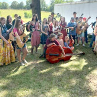 Participants in the Russ Morton Youth Showcase at the 2023 July Starvy Creek Bluegrass Festival - photo by Tammy Harman