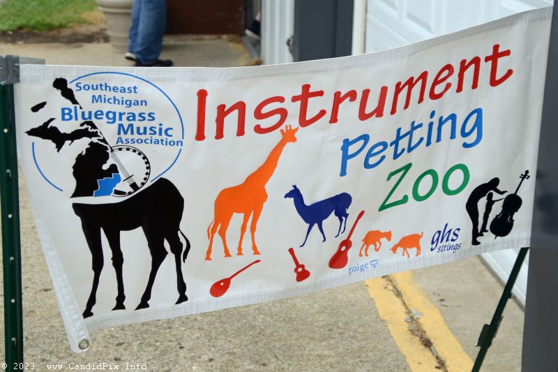 Instrument petting zoo at the 2023 Brown County Bluegrass Festival - photo © Bill Warren