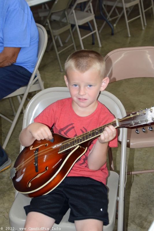 Instrument petting zoo at the 2023 Brown County Bluegrass Festival - photo © Bill Warren