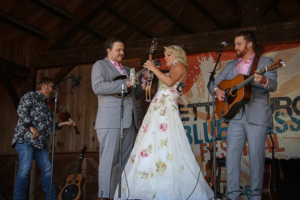 Zack Arnold twins with Rhonda Vincent at the August '23 Gettysburg Bluegrass Festival - photo © Frank Baker